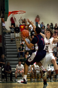 Junior guard Jordan Howard goes up for lay-up in the Pumas game against Campo Verde earlier this year.
