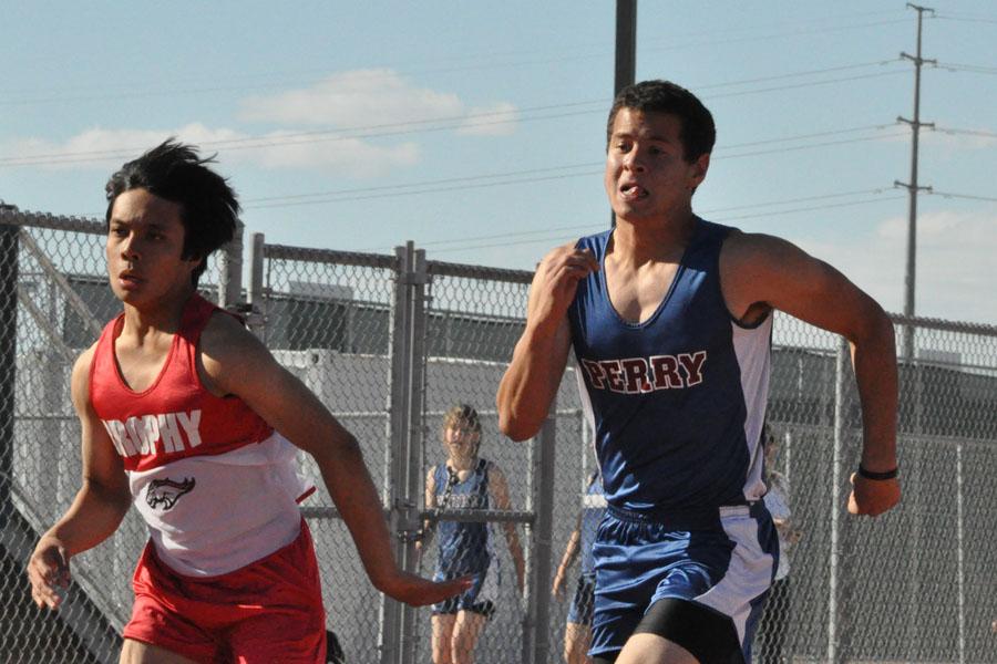 Track+runner+Sean+Harns+sprints+to+the+finish+at+a+meet+against+Brophy+high+school.%0D%0A