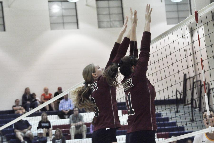 (From left) Abbie McDonald and Ashley Greene attempt to block a shot.
