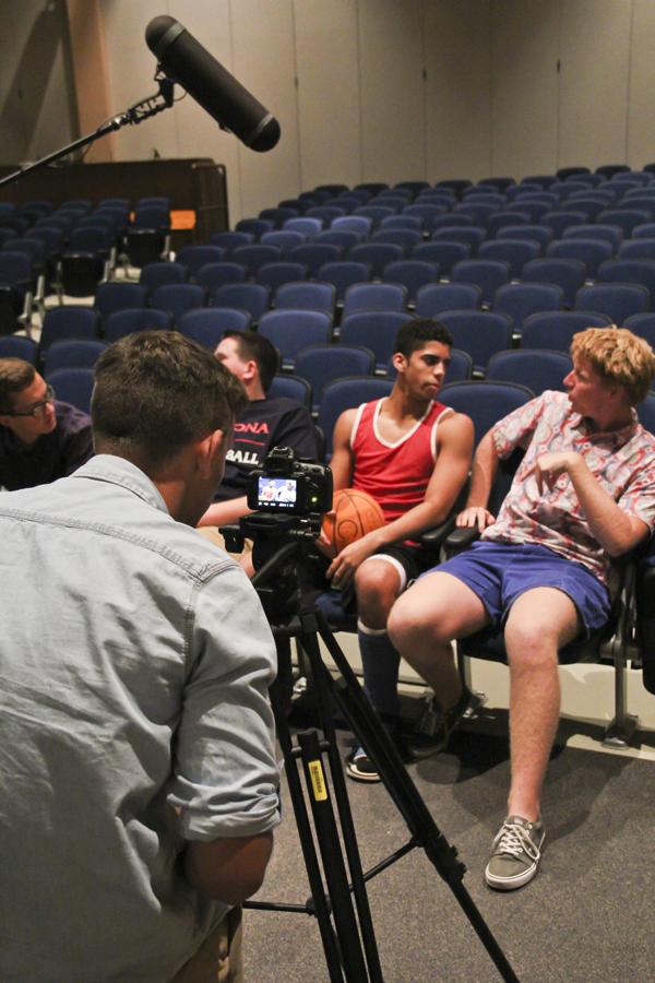 Perry Prime Times Caleb Ragatz films Jordan Howard and Parker Coreys interview in the auditorium.