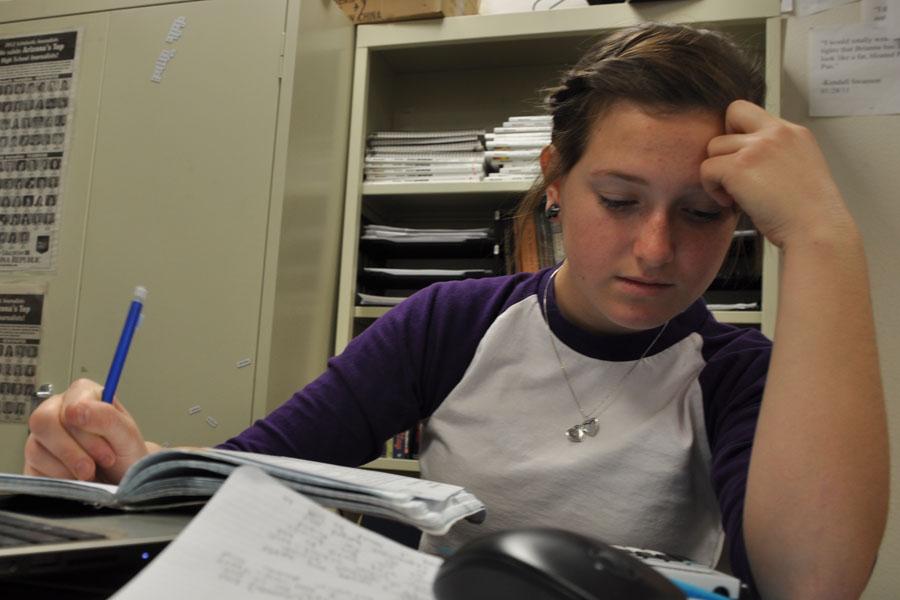 Students try to balance surplus amounts of homework and after-school extracurriculars.