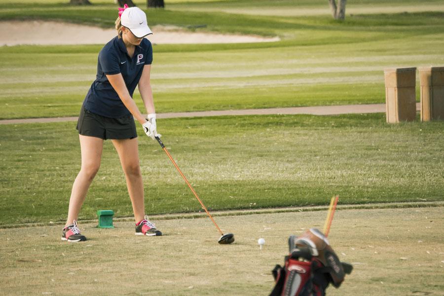 Sophomore Kati Golf starts her windup for a drive