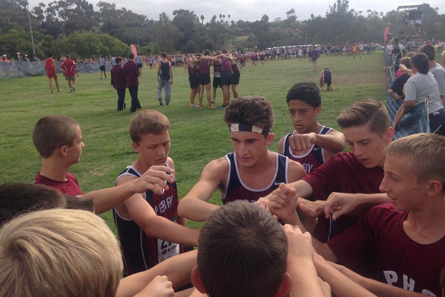 Cade Burks gives words of encouragement to his fellow teammates before the race in San Diego, California