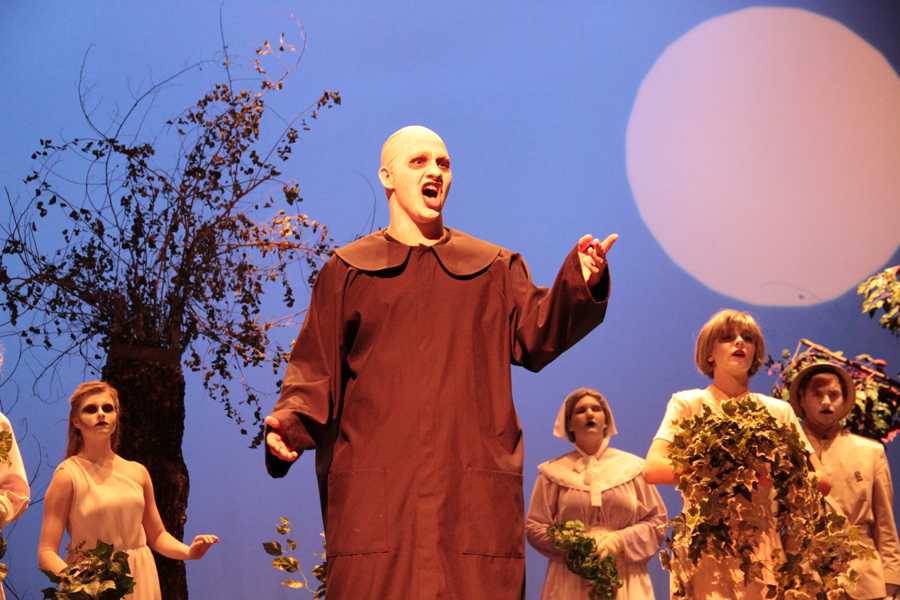 Junior Steven Ricks performs during as Uncle Fester during the fall production of The Addams Family.