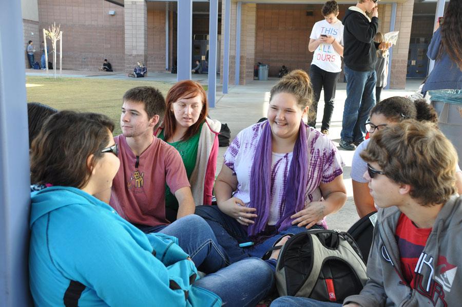 Randi Chatelain socializes with friends during lunch.