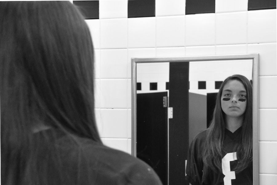 Freshman, Trinity Kaufman, is the first female to play football at Perry. She is breaking the status quo in terms of football being a male-only sport.