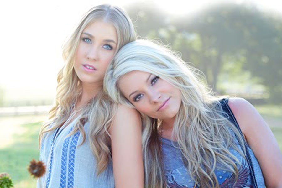 Madison Maddie Marlow (left) and Taylor Tae Dye (right) pose for their first album photo shoot. The girls album Start Here debuted Aug. 28. 