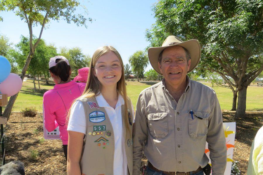 Senior Katie  Hartle stands next to her project advisor, Claud Cluff. He is from the City of Chandler Parks Department. 
