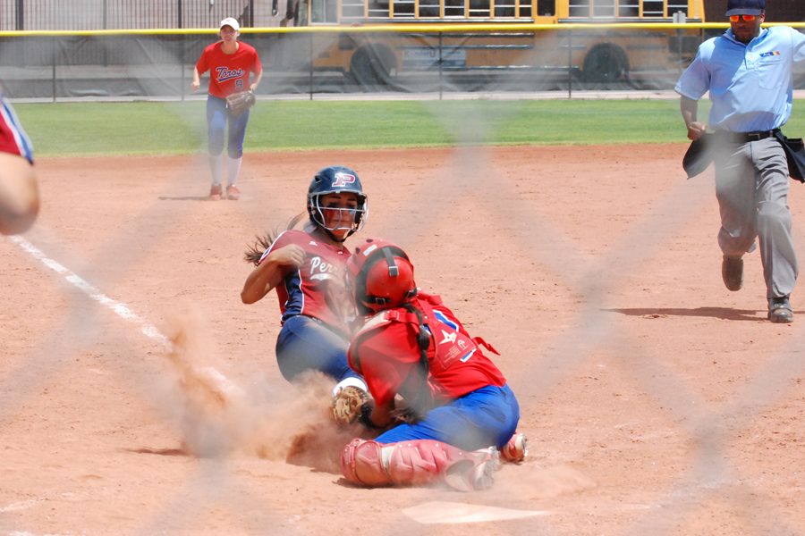 Freshman Natalie Arbizu gets thrown out at home plate during the Pumas 4-2 win over Mountain View.