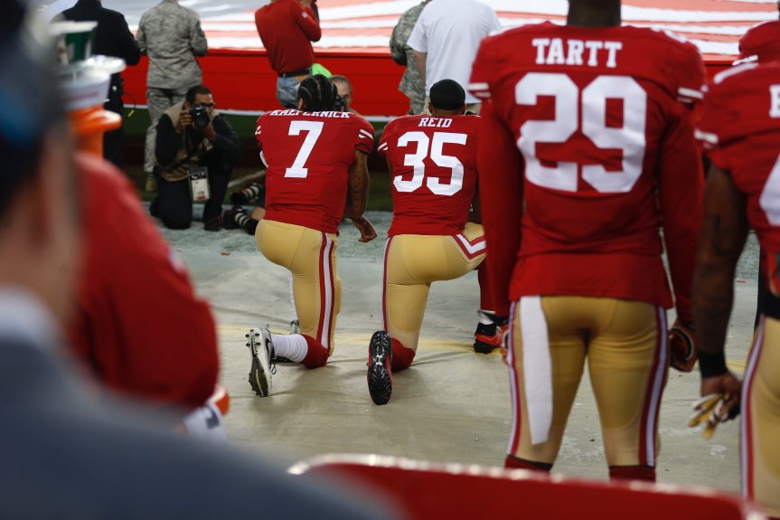 San Francisco 49ers quarterback Colin Kaepernick (7) kneels during the National Anthem before their game against the Los Angeles Rams for their NFL game at Levis Stadium in Santa Clara, Calif., on Monday, Sept. 12, 2016. (Nhat V. Meyer/Bay Area News Group)