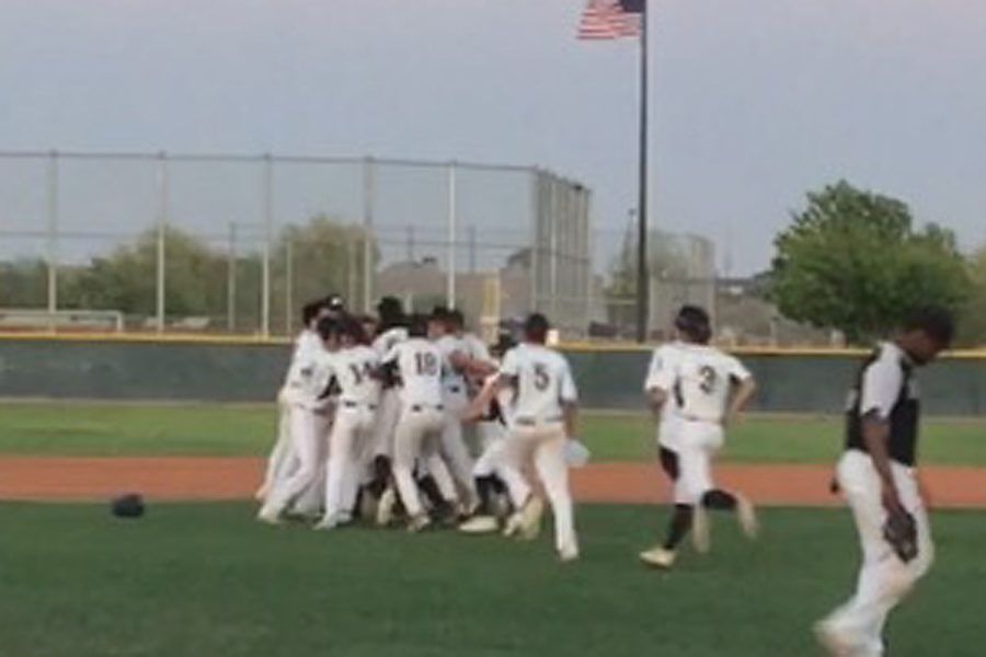 The junior varsity baseball team celebrates its 15-14 walk-off win over Hamilton on Mar. 30. This win came just minutes after the freshmen team and the varsity softball team walked-off wins over the Huskies as well.