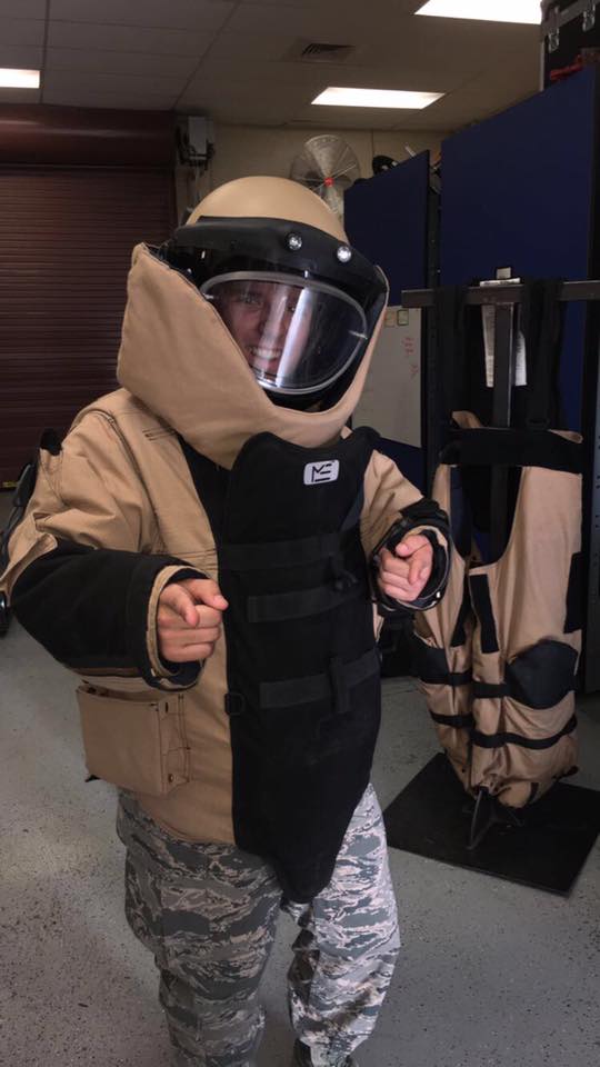 Martin (12) poses in an Explosive Ordinance Disposal (EOD) suit at Luke Air Force Base, where the JROTC corps toured with the 944th Fighter Wing.