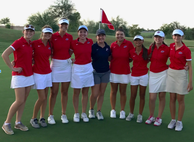 The varsity girls golf team, including the developmental players