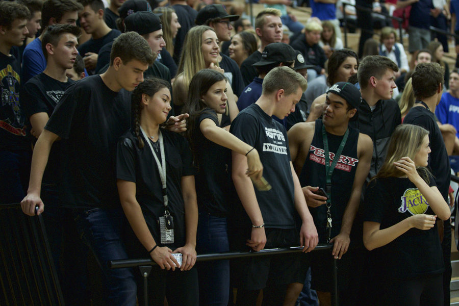 Students wait for the final game in the 6A state semifinals