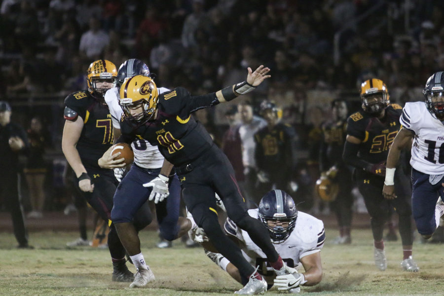 Senior Amir Issa sacks Nick Wallerstedt (11) in Perrys 56-31 semifinal win over No. 1 Mountain Pointe.