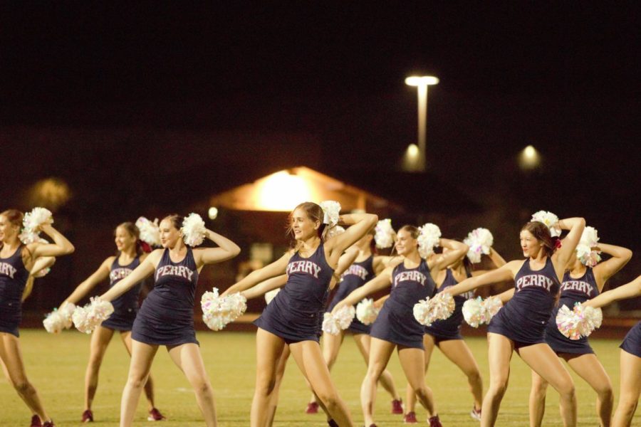 Perry Pom shakes up the field at a home football game