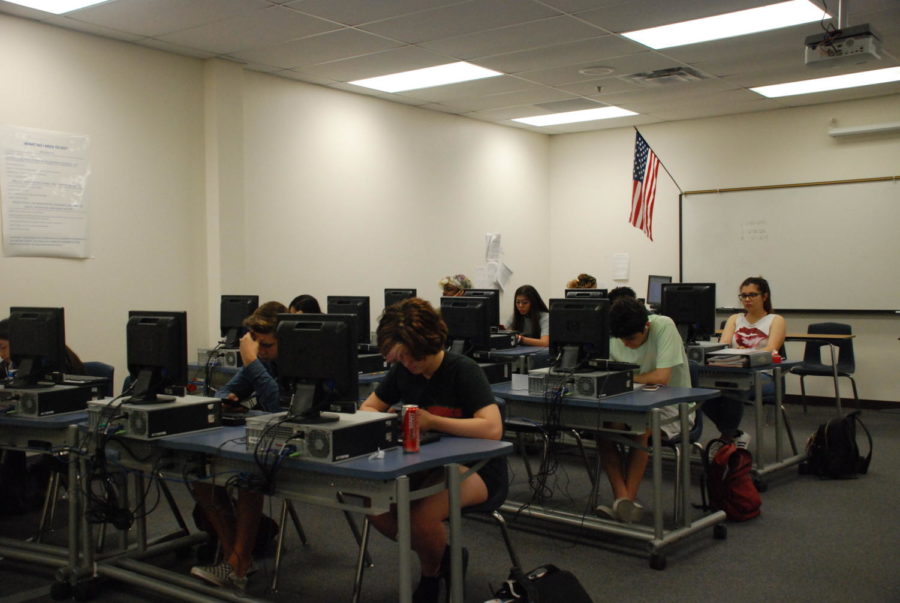 Students work diligently to complete their classes.