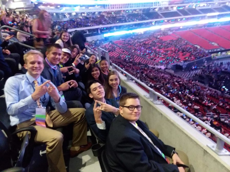 DECA students sit ad wait for the final resultes at the International DECA Competition.