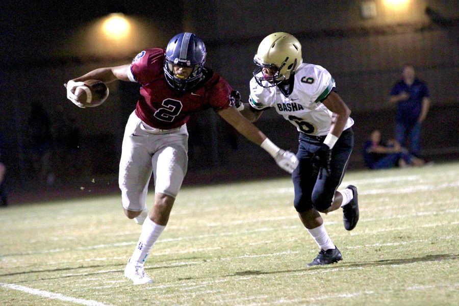 DShayne James breaks away from a Basha defender in 2017. James was poised to split time as quarterback and wide receiver before suffering a knee injury before the start of his senior year.