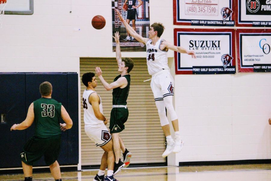 Anderson attempts t block a shot during the Pumas Jan. 22 matchup against Basha