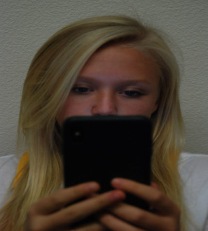 Kenna Cassey is just one of many students who uses their phone in class.