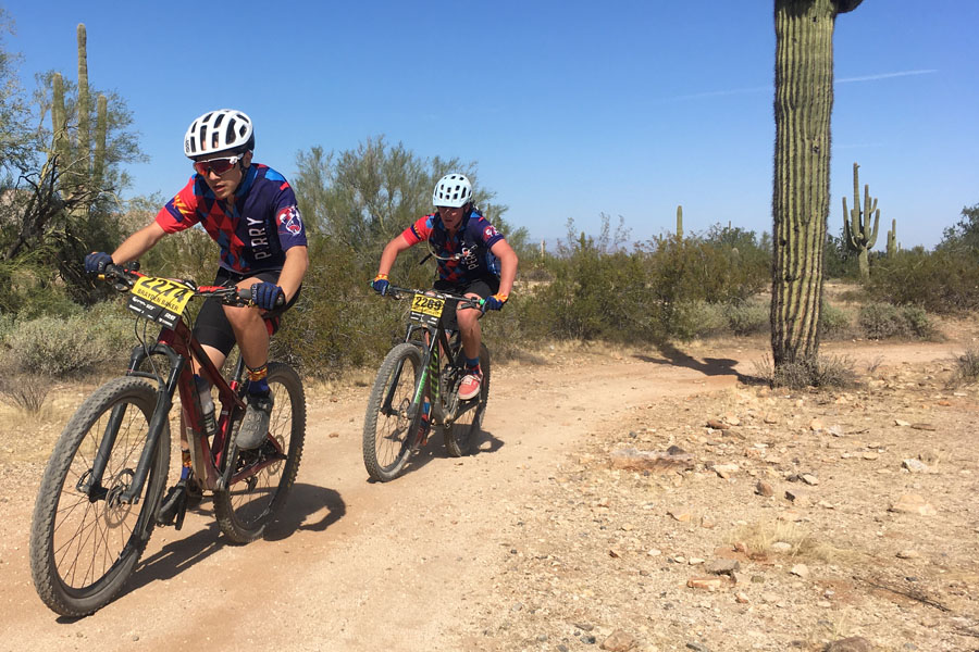 Members of mountain bike club riding at their last race of the reason. The team finished with their second best placement of the season in 16th.