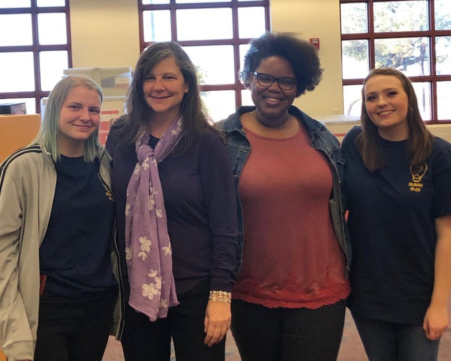 Board members Lindsay Love and Laura Bruner meet with club members to discuss the Period Project. The project began in 2019 in response to the lack of female hygiene products in the girls bathrooms on campus. 