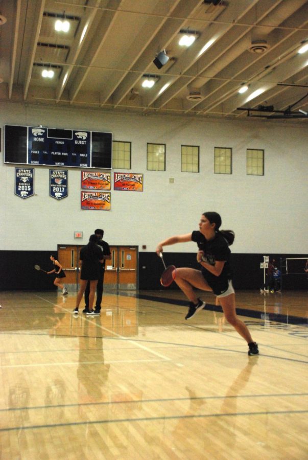 Kate McPherson, Senior, returns a serve in the Badminton Championships playing as the number 1 seed. On November 12, Varsity   Badminton participated in the Badminton Team State championship, earning their fourth consecutive title. 