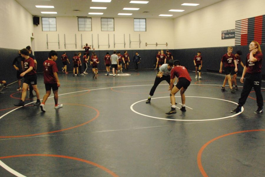 Perry Wrestlers practice for a postponed season on Thursday Dec.10. COVID numbers have remained in the red  zone, leaving winter sports athletes waiting for their first contest.