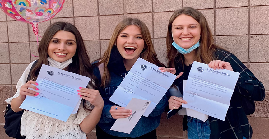 Juniors Abby Carraro, Brooke Lassen, and Elizabeth Perkins receiving their letters on Mar. 14 informing them, they have been voted in to hold a student body office next school year.  