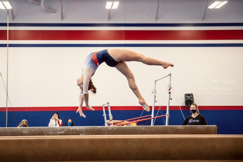 Senior+gymnast+Avery+Bibbey+practices+her+beam+routine+at+gym+every+day.+Bibbey+is+a+level+10+at+USA+Illusions+and+has+been+doing+gymnastics+her+whole+life.+