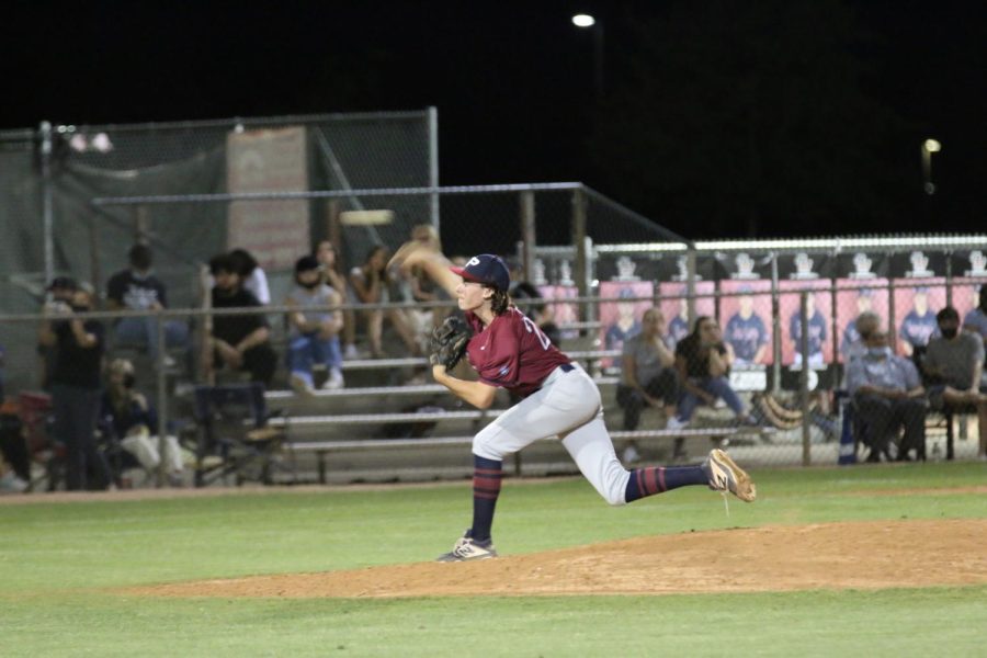 Dylan Butler throws a pitch against Red Mountain. According to maxpreps.com, Dylan has an opponent batting average of .308 so far this season.