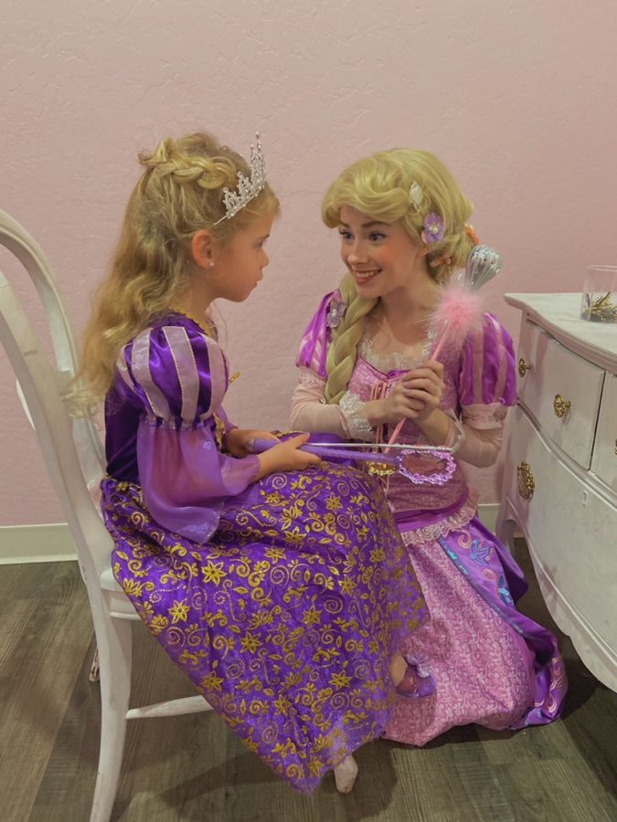Olivia+Woodward-Shaw+performs+as+the+character+Rapunzel.+Woodward-Shaw+loves+to+put+smiles+on+little+kids+faces+through+spreading+her+talents+with+the+world.