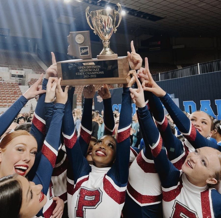 Pom celebrates their State Championship win for their Jazz routine. This is the first time in school history pom has won a State title. 