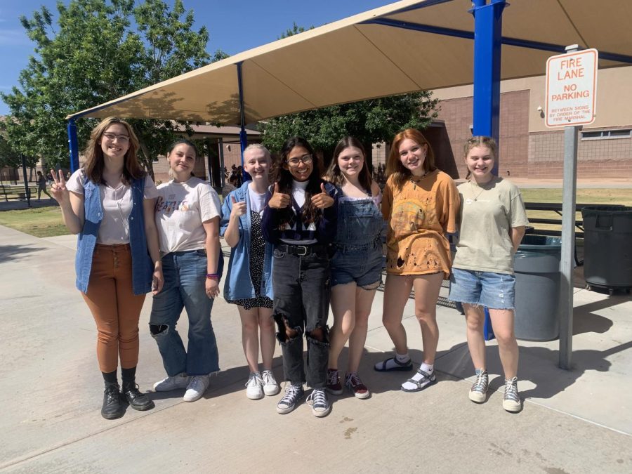 Members of the Environmental club show off their summer fashion choices while staying sustainable and environmentally aware. By sourcing clothes from pre-existing means such as thrifting, teens can stay fashionable and reduce their waste intake. 