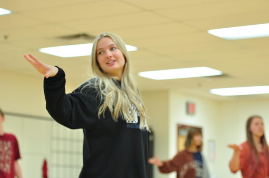 Senior Eden Smith demonstrates ensemble choreography in Mamma Mia! auditions.