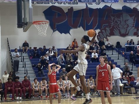 Senior, Cody Williams making a massive dunk with the win against the Boulder Creek Jaguars, 89-55