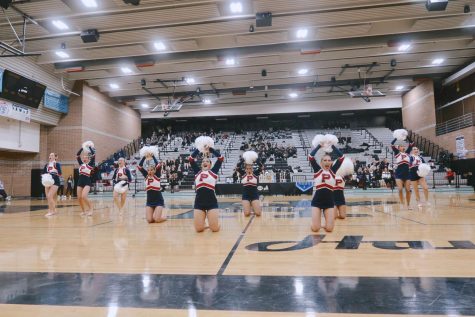 At Highland High School, Pom performs at a regional competition to help prepare for Nationals in the future. They showcase two routines for their performance.