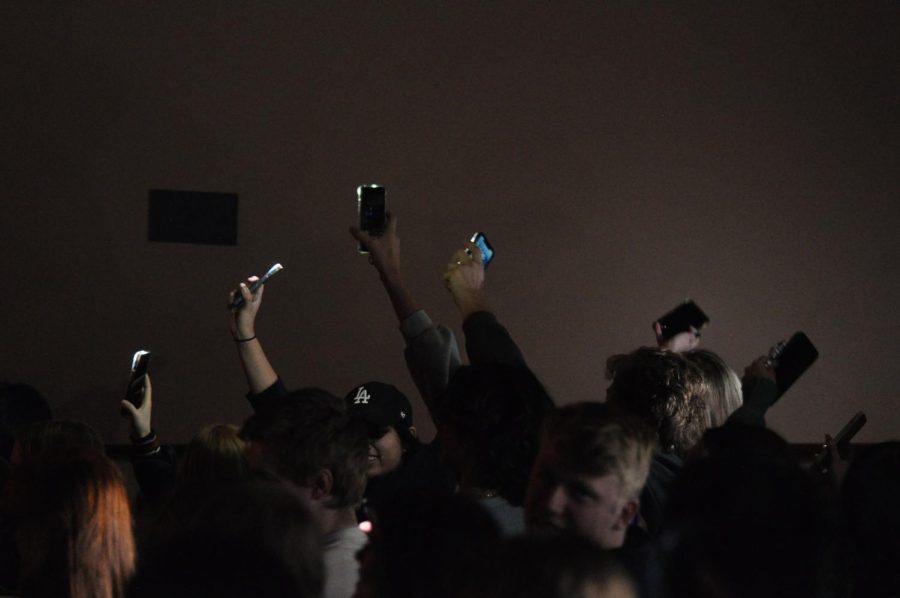 Students+supported+the+performers+by+waving+their+phone-flashlight+in+the+air+at+Perry+Idol.+StuGo+hosted+Perry+Idol+on+Friday%2C+Jan.+20+in+the+school+auditorium.