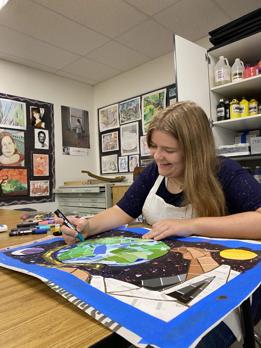 Senior, Audree Davis, working on an art project consisting of making a globe out of cut pieces of paper for her AP Studio Art class. Students of AP Studio Art will spend the rest of their year working on their AP art portfolios.