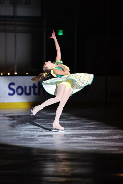 Junior Kate Wilson performs on ice to a rendition of ‘Maybe Love’ from the 2023 musical Shucked. Figure skating allows Wilson a creative outlet to embrace her performance skills and mental strength.