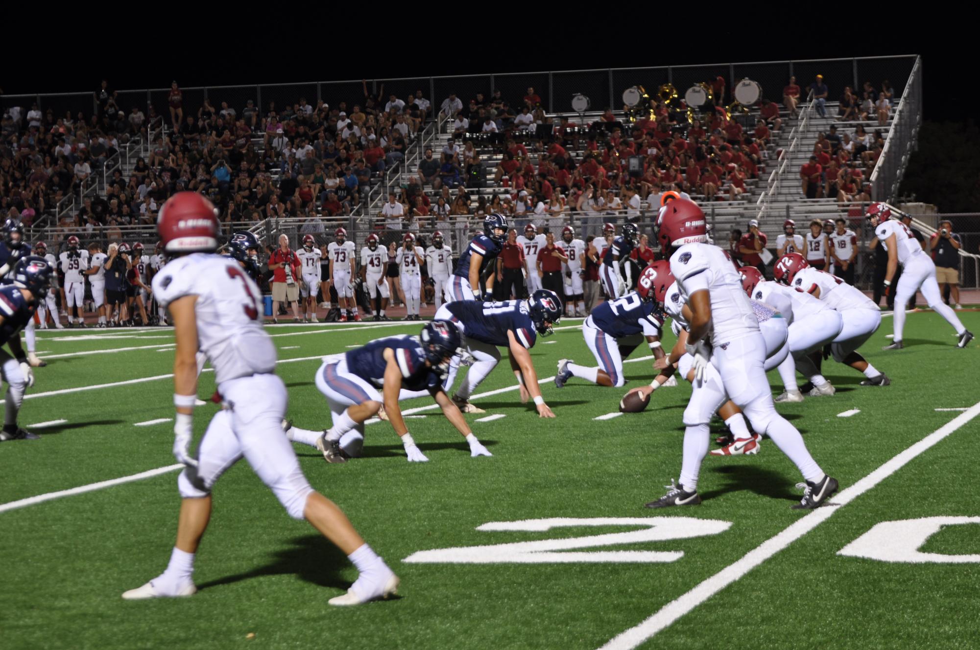 Varsity football lines up at the 20 yard line during the game against Desert Ridge on Aug. 30. The final score was 40-7.