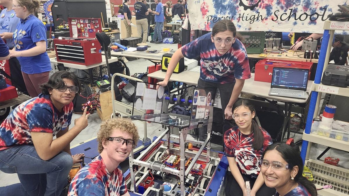 Pumatronix team members in progress building their robot for FIRST 2025.
