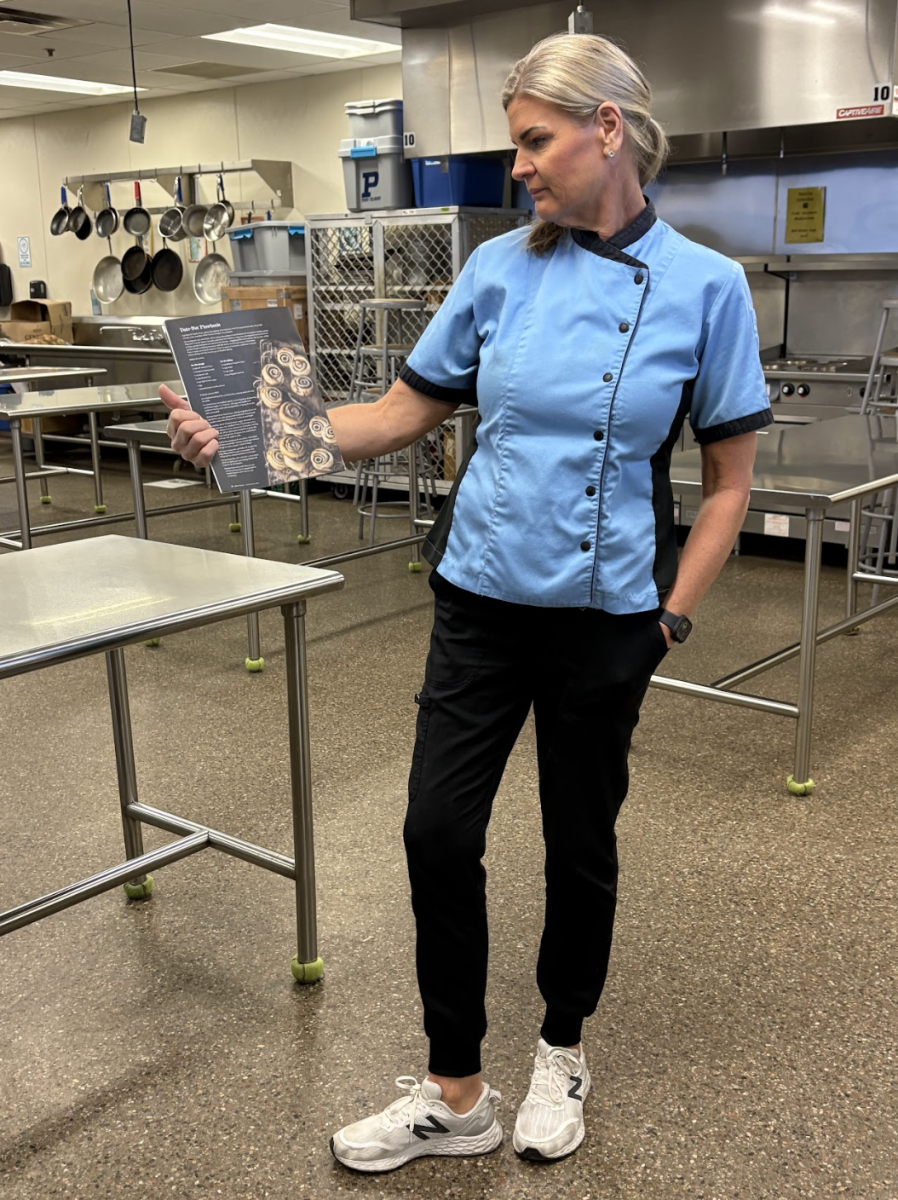 Culinary arts teacher Angela Stutz shows off her date-nut pinwheel recipe. Stutz was featured in a local editorial, Edible Phoenix. Stutz makes the recipe around the holidays to share with her and her family. 