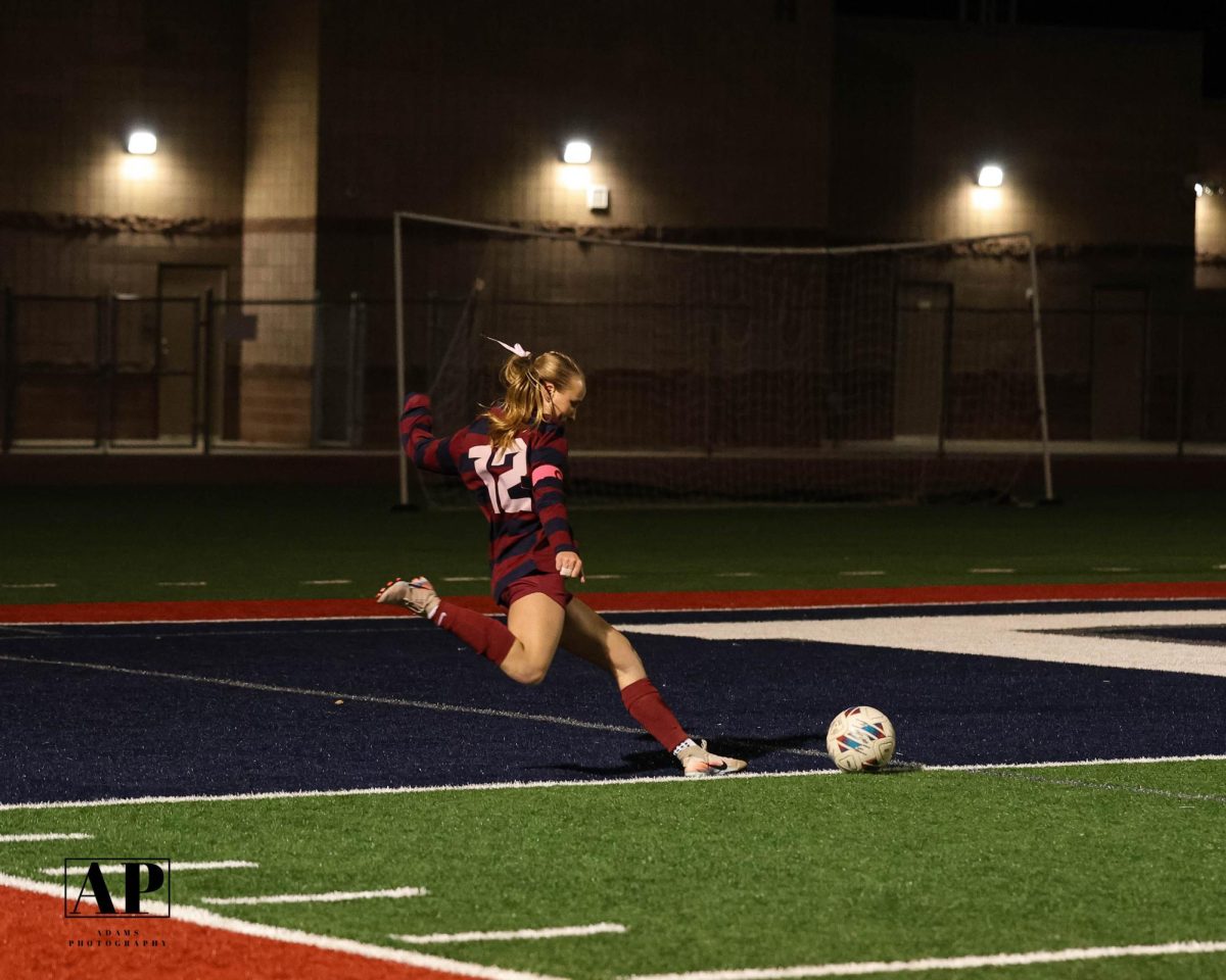Saydie Herbert went to kick the ball into the goal in the game against Casteel. The team went on to win that game.