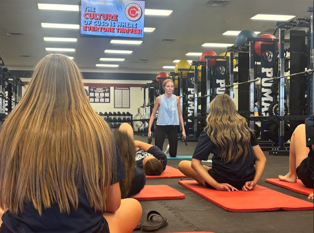Samantha Lewis instructing a pilates class